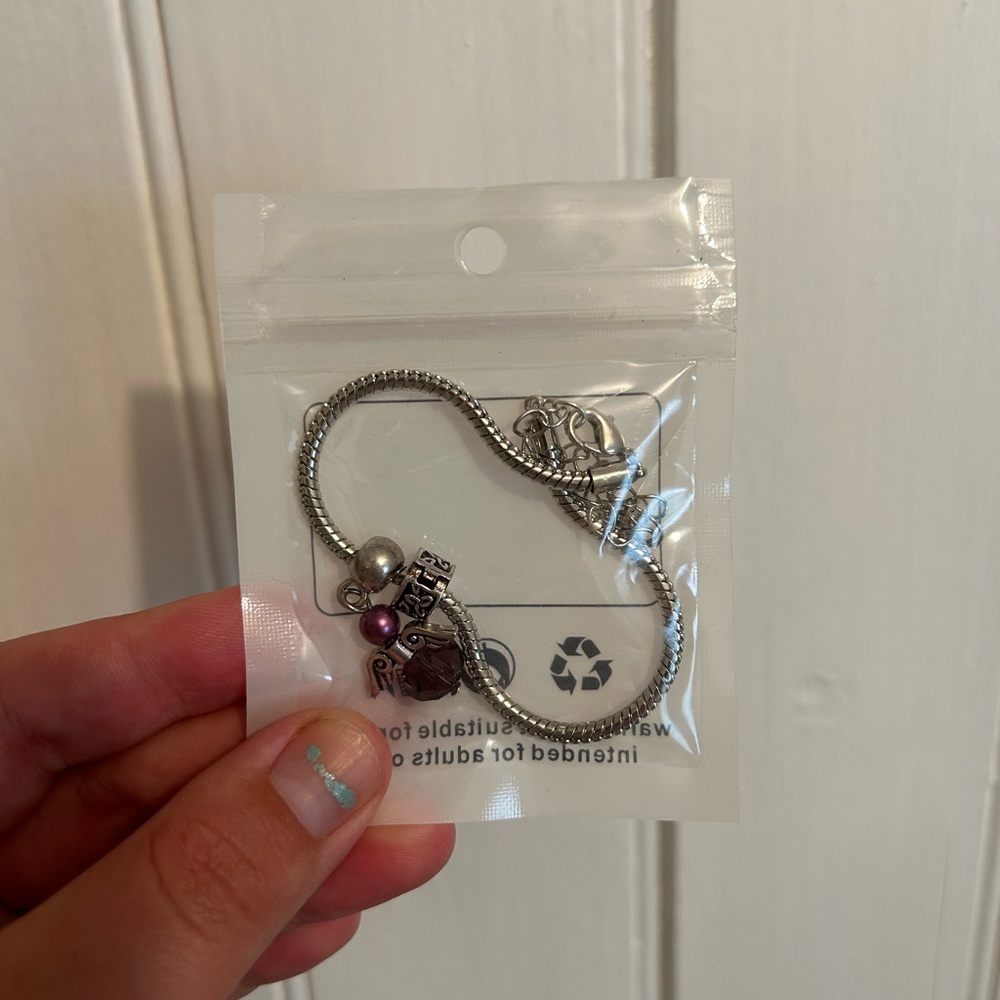 NEW silver charm bracelet with purple angel charm